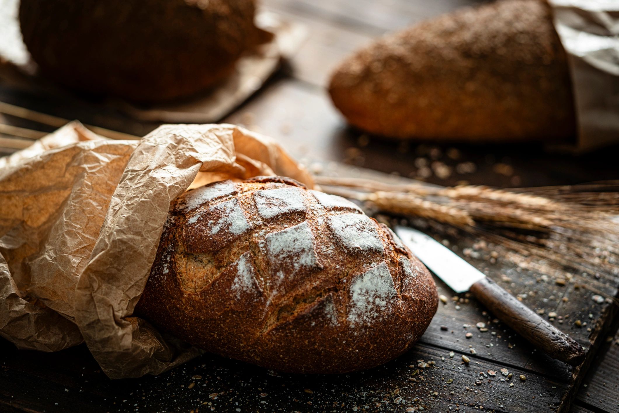 Wholegrain bread on rustic table